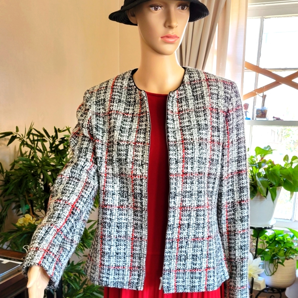 Very nice jacket with silver zipper.
